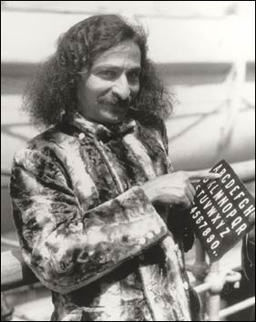 Meher Baba maintained silence and communicated using an alphabet board